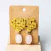 Pendientes perla amarillos