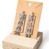 Pendientes hiedra grises.