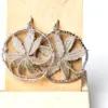042 Pendientes margarita beige