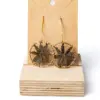 Pendientes margarita marrones