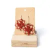 Pendientes circulares estrella granates