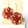 Pendientes circulares estrella granates
