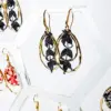 Pendientes hiedra negros