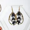 Pendientes hiedra negros