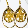 096 Pendientes flor amarilla