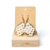 117 Pendientes gota blancos