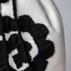 Bolso artesanal de encaje de bolillos “Fasquía”