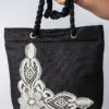 Bolso artesanal de encaje de bolillos “Recuncho”